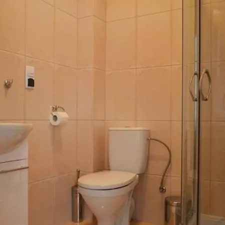 B&B Goscinne W Ratuszu 오그로지에니에츠